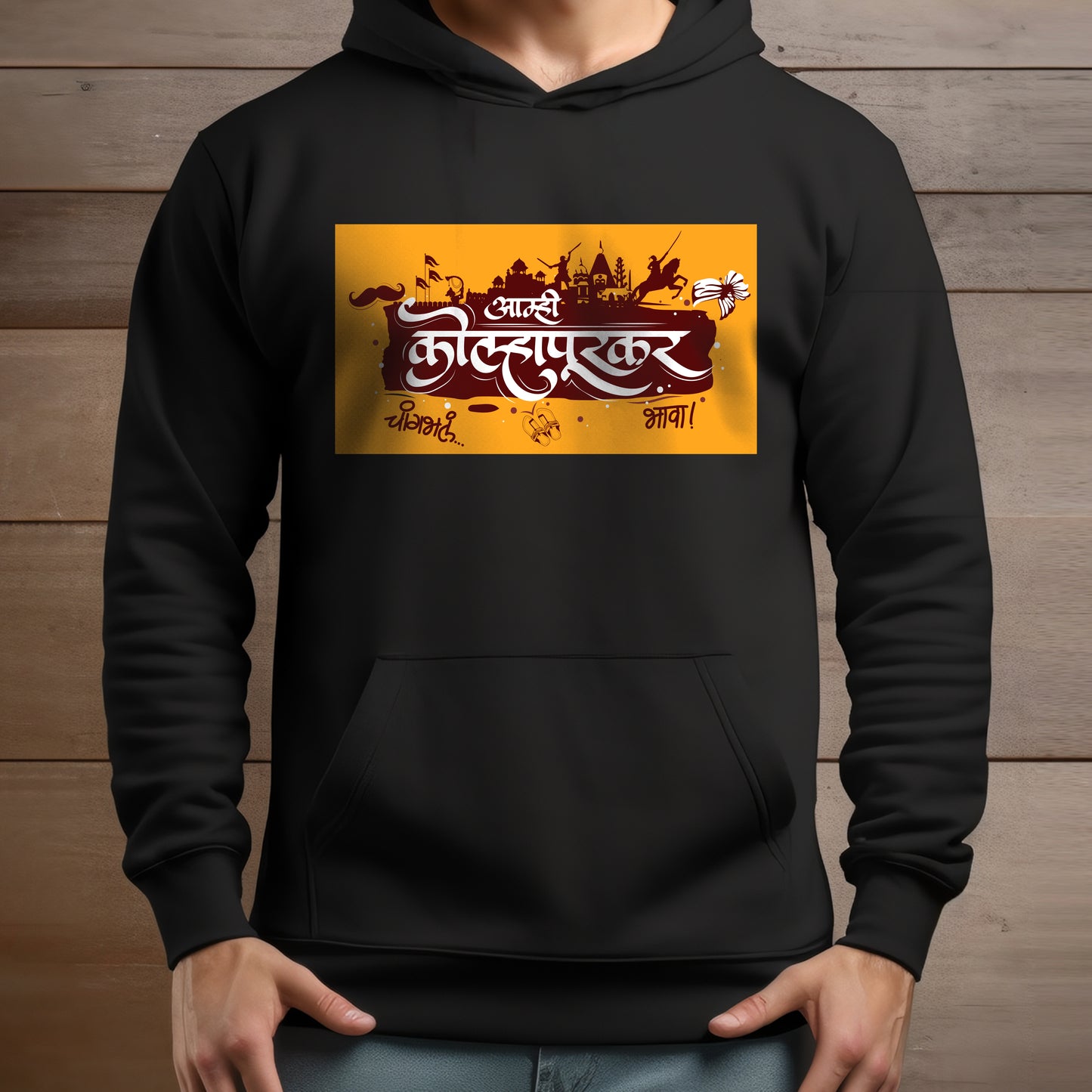 "Amhi Kolhapurkar" Unisex Graphic Hoodie by WhimsyWrap featuring bold Marathi text, made from 100% cotton for a soft, breathable feel. Available in sizes S, M, L, XL. A stylish and comfortable hoodie celebrating Kolhapur's culture and heritage.