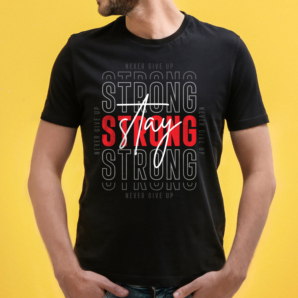 Shop the 'Stay Strong' Unisex Graphic T-Shirt by WhimsyWrap, featuring an inspiring cartoon design with a motivational message. This comfortable and stylish T-shirt is perfect for casual wear, promoting strength and resilience. Ideal for both men and women who want to express positivity and stay motivated with unique graphic tees.